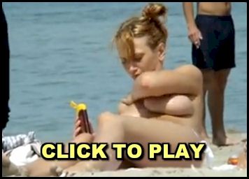 Video of busty and topless girl at the beach