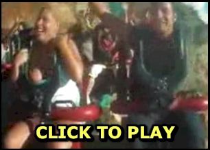 Girl flashing boobs on a rollercoaster