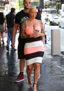 Amber Rose braless cleavage