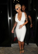 Amber Rose braless cleavage