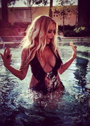 Aubrey O Day in a swimsuit