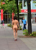 Busty and nude in public