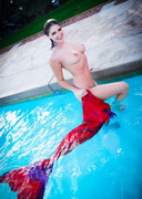 Topless mermaid Carlotta Champagne