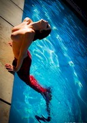 Topless mermaid Carlotta Champagne