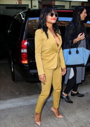 Christina Milian blazer cleavage