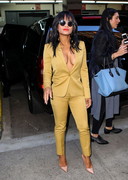 Christina Milian blazer cleavage