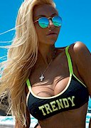 Busty Russian blonde in a bikini