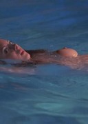 Eva Amurri topless in a pool