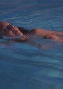 Eva Amurri topless in a pool