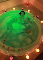 Busty babe in a hot tub