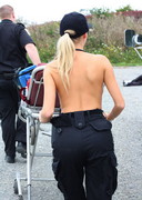 Busty and topless paramedic