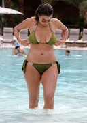 Imogen Thomas in a pool