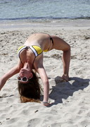 Imogen Thomas doing bikini yoga