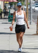 Kaley Cuoco in a tank top