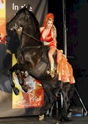 Katie Price rides a horse