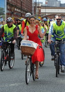 Kelly Brook cleavage on a bike