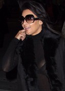 Kim Kardashian in a see through top