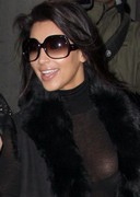 Kim Kardashian in a see through top