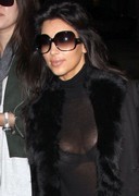 Kim Kardashian in a see through top