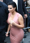 Kim Kardashian cleavage in tight dress
