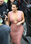 Kim Kardashian cleavage in tight dress