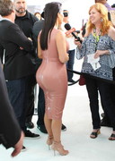 Kim Kardashian cleavage in tight dress