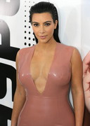 Kim Kardashian cleavage in tight dress