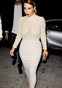 Kim Kardashian in a mesh top