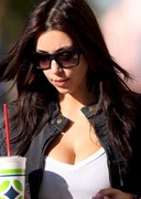 Kim Kardashian suck a straw