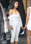 Kim Kardashian cleavage in white