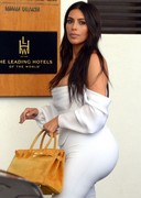 Kim Kardashian cleavage in white
