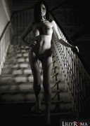 Lilly Roma nude on stairs