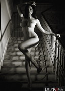 Lilly Roma nude on stairs