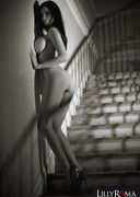 Lilly Roma nude on stairs