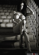 Lilly Roma nude on stairs