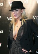 Lindsay Lohan see through top cleavage