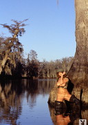Naked babe in the swamp