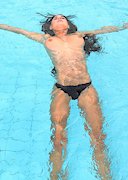 Topless swim in the pool
