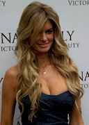 Busty model Marisa Miller promotes a lotion