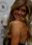 Busty model Marisa Miller promotes a lotion