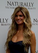 Busty model Marisa Miller promotes a lotion