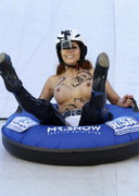 Topless babes snow tubing