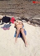 Monica Mendez topless at the beach