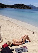 Monica Mendez topless at the beach