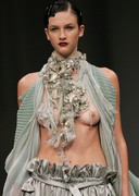 Runway models with exposed tit