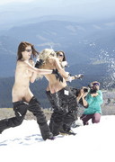 Naked babe snowboarding