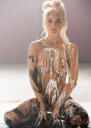 Naked babe covered in paint