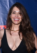 Sarah Shahi braless cleavage