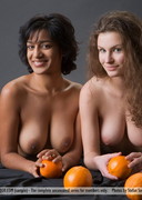 Two busty and naked babes