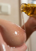 Big tits covered in oil